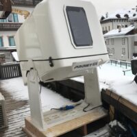Outdoor installation of a video projector inserted in a custom PROIETTA CASE AF32