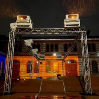 Installing a video projection system outdoors is not an issue if the projectors are housed in protective enclosures.